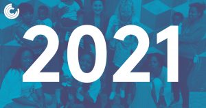 Text reading 2021 is displayed over an image of happy people tinted blue